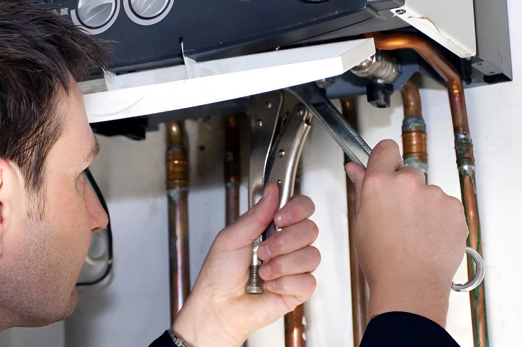 Image Of A PLumber Fixing A Pipe | Plumber Wahroonga | JET Plumbing